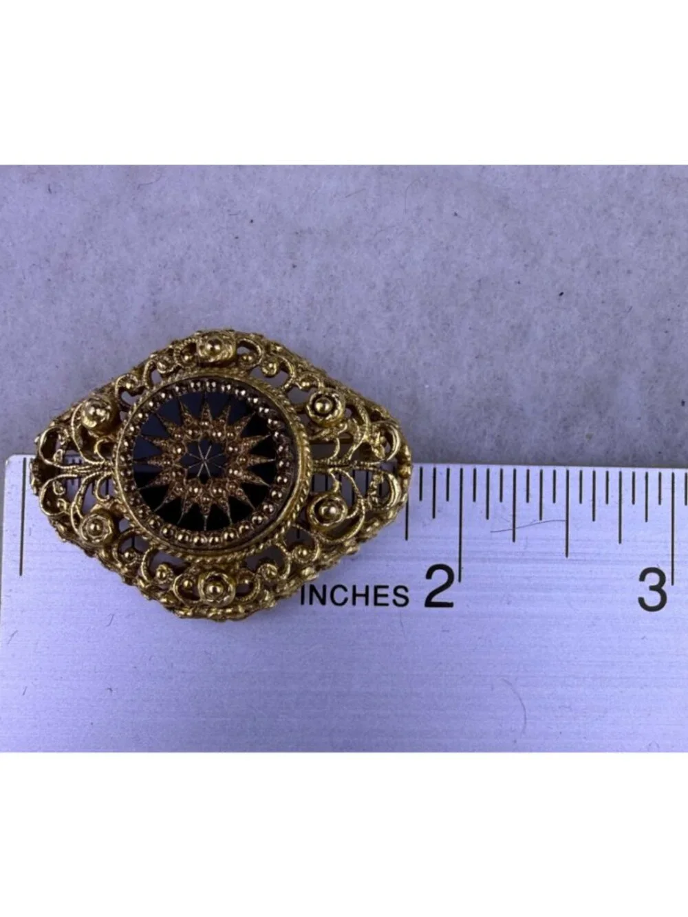 Vintage Unknown Gold Tone Black Glass Filigree Brooch Intricate Design Classic